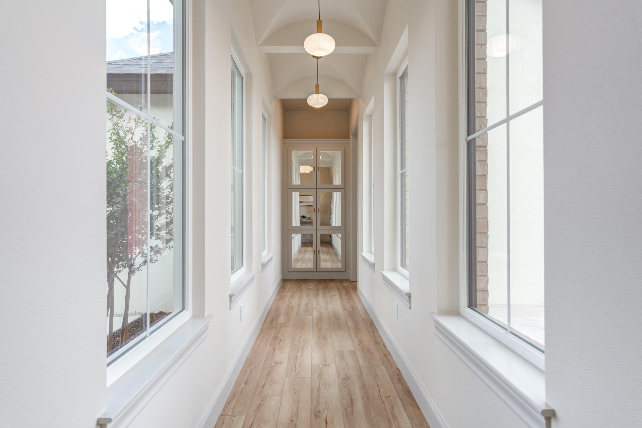 609 North 15th Street Wolfforth, TX 79382 - Photo 3 of 76 a view of a hallway with wooden floor and staircase