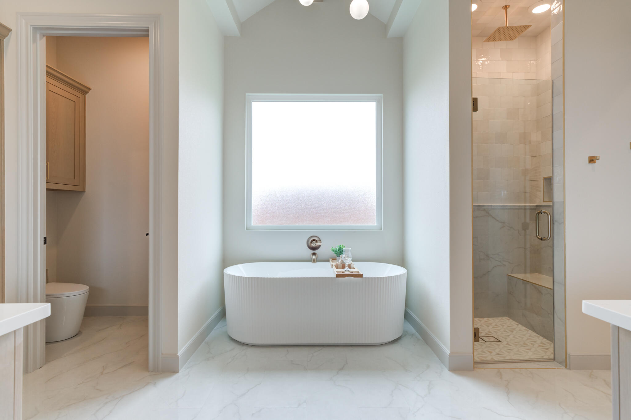 609 North 15th Street Wolfforth, TX 79382 - Photo 41 of 76 a white bath tub sitting next to a white toilet