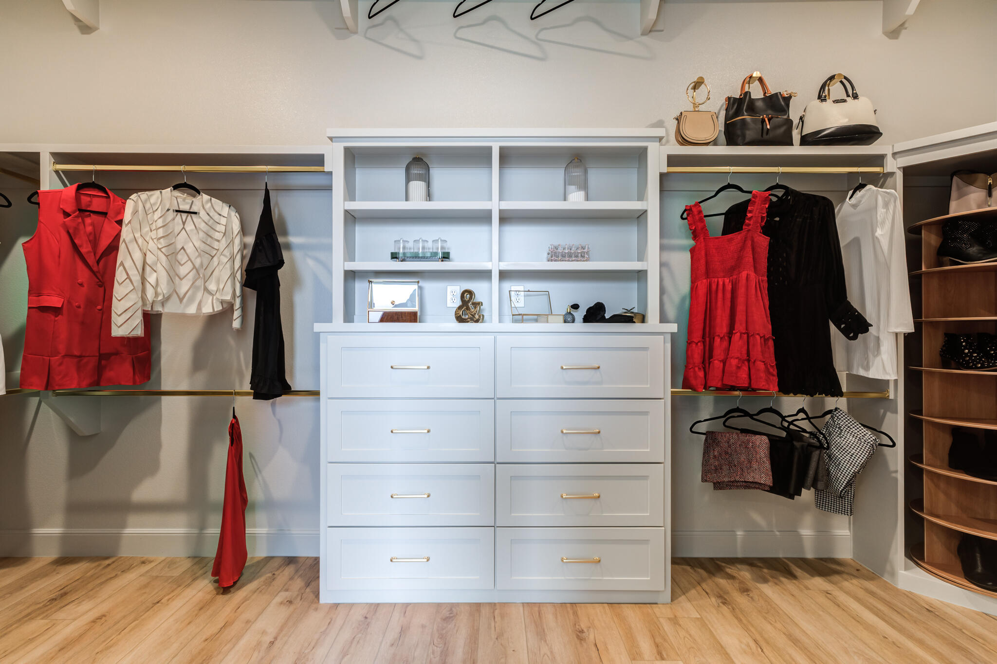 609 North 15th Street Wolfforth, TX 79382 - Photo 44 of 76 a view of walk in closet with clothes and shoes