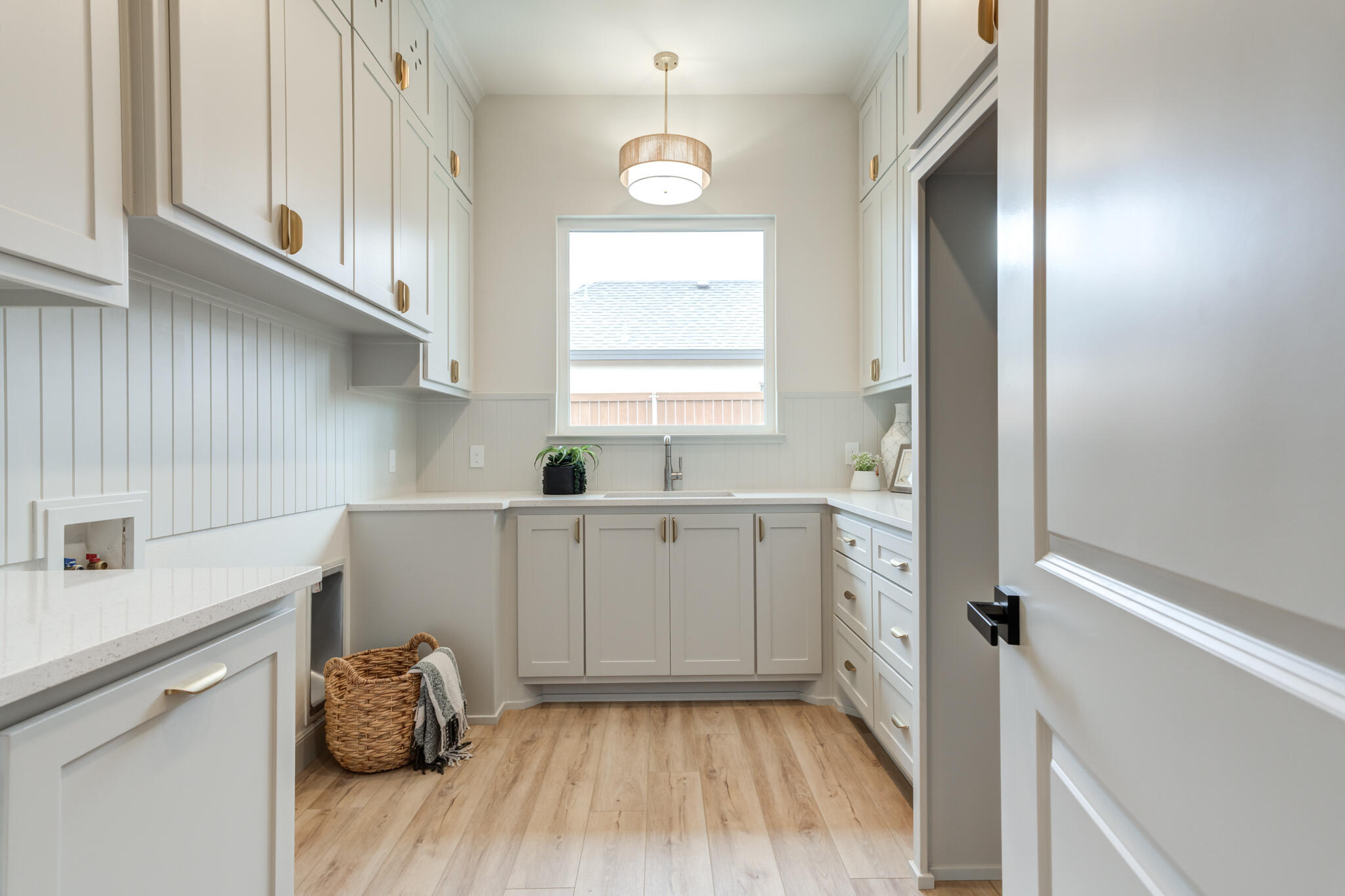 609 North 15th Street Wolfforth, TX 79382 - Photo 46 of 76 a kitchen with cabinets a window and appliances