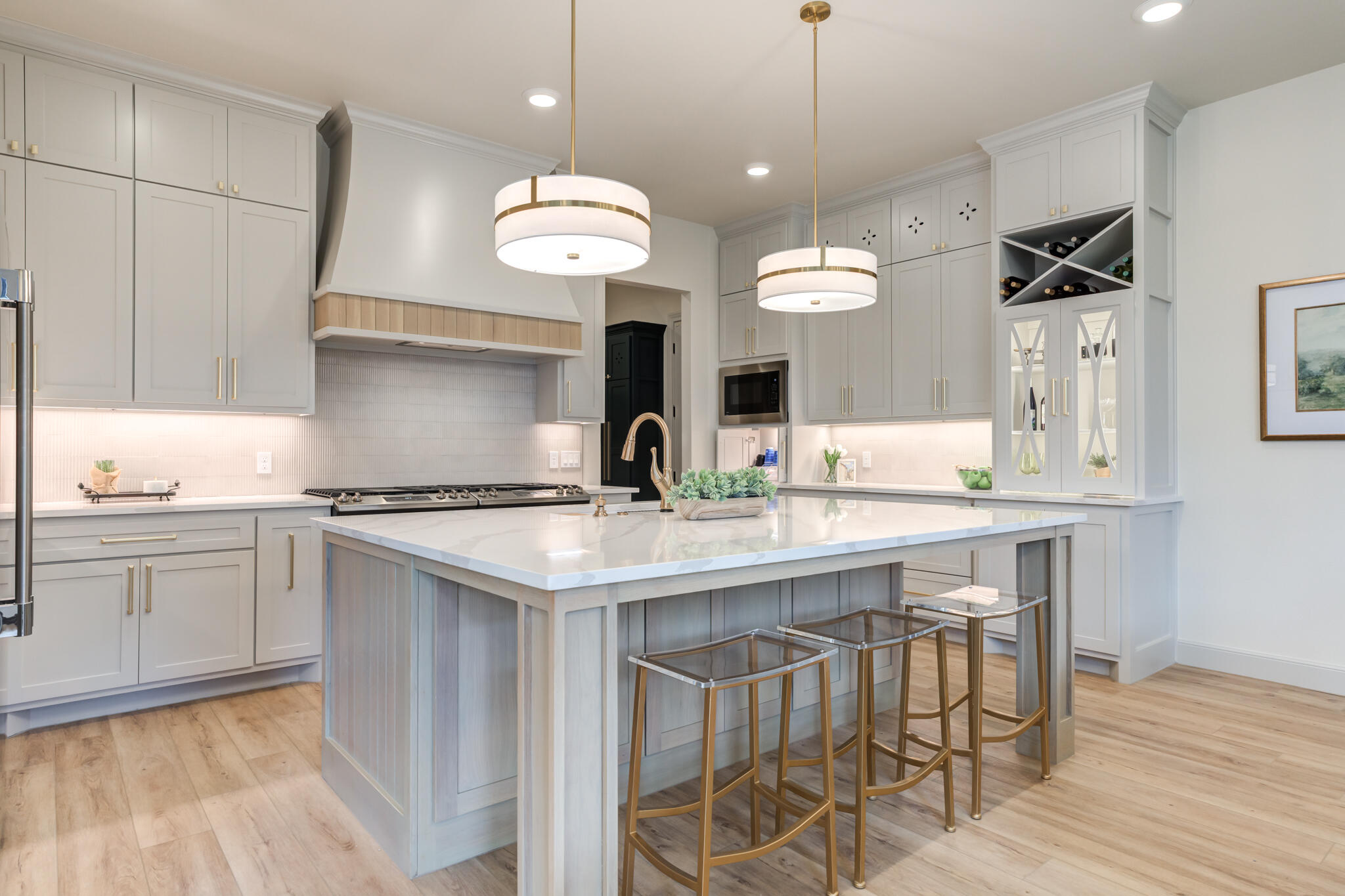 609 North 15th Street Wolfforth, TX 79382 - Photo 55 of 76 a kitchen with a sink and a refrigerator