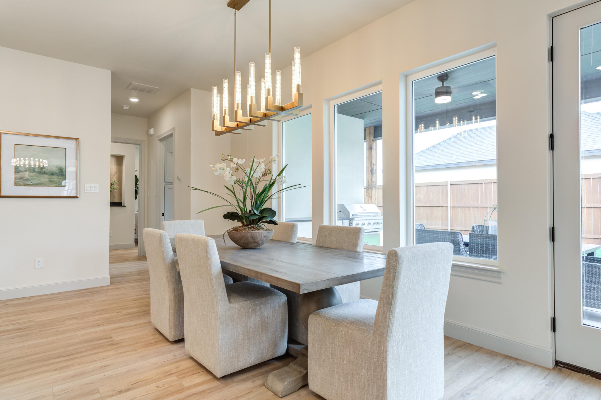 609 North 15th Street Wolfforth, TX 79382 - Photo 57 of 76 a view of a dining room with furniture wooden floor and chandelier