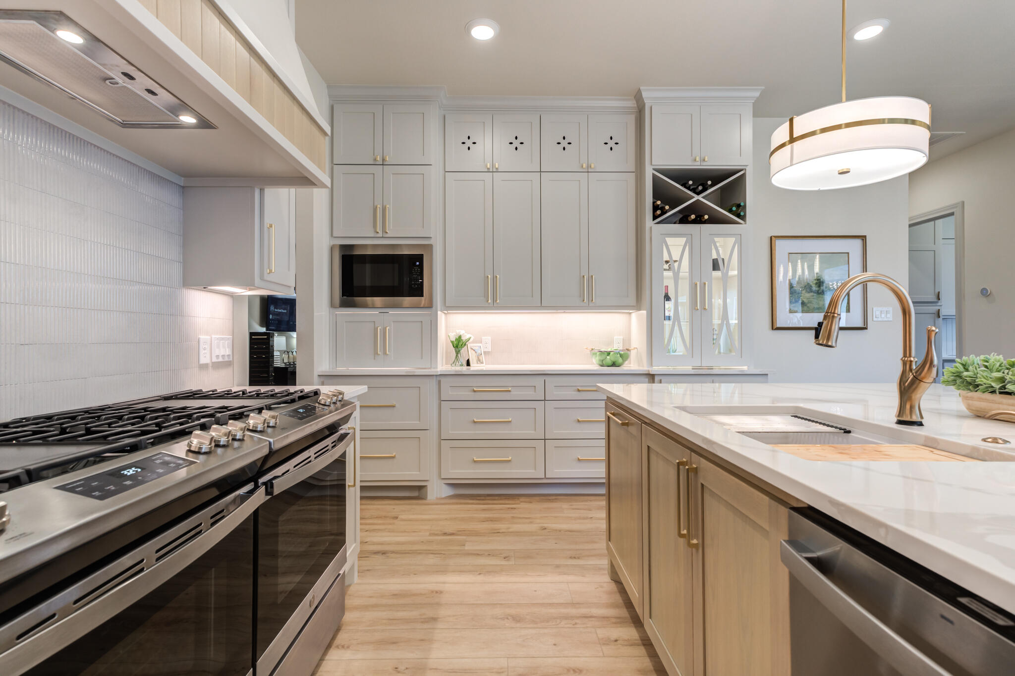 609 North 15th Street Wolfforth, TX 79382 - Photo 61 of 76 a kitchen with stainless steel appliances granite countertop a sink and a stove