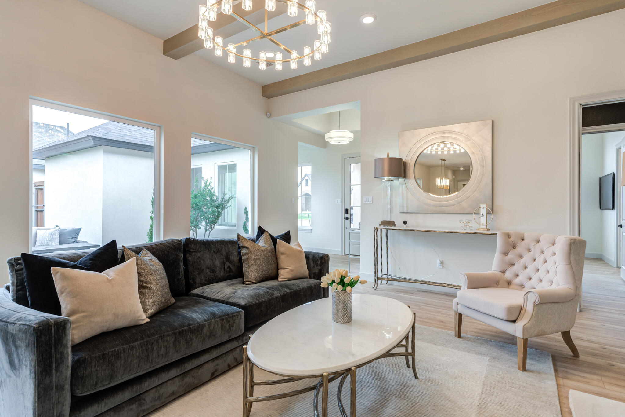 609 North 15th Street Wolfforth, TX 79382 - Photo 72 of 76 a living room with furniture and a large mirror