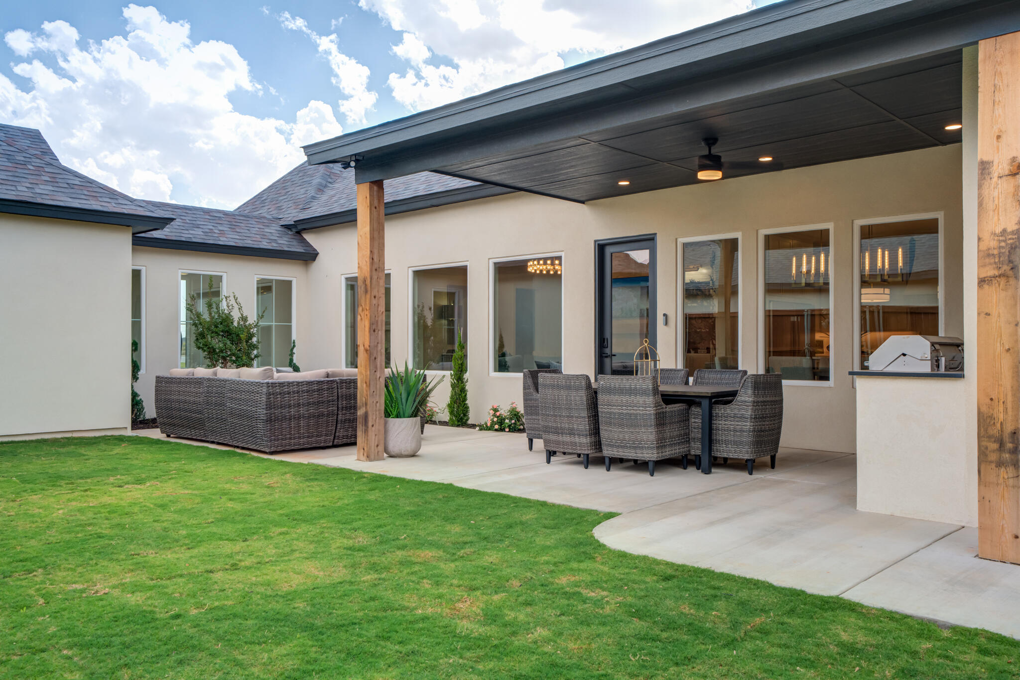 609 North 15th Street Wolfforth, TX 79382 - Photo 76 of 76 a view of a house with backyard sitting area and garden