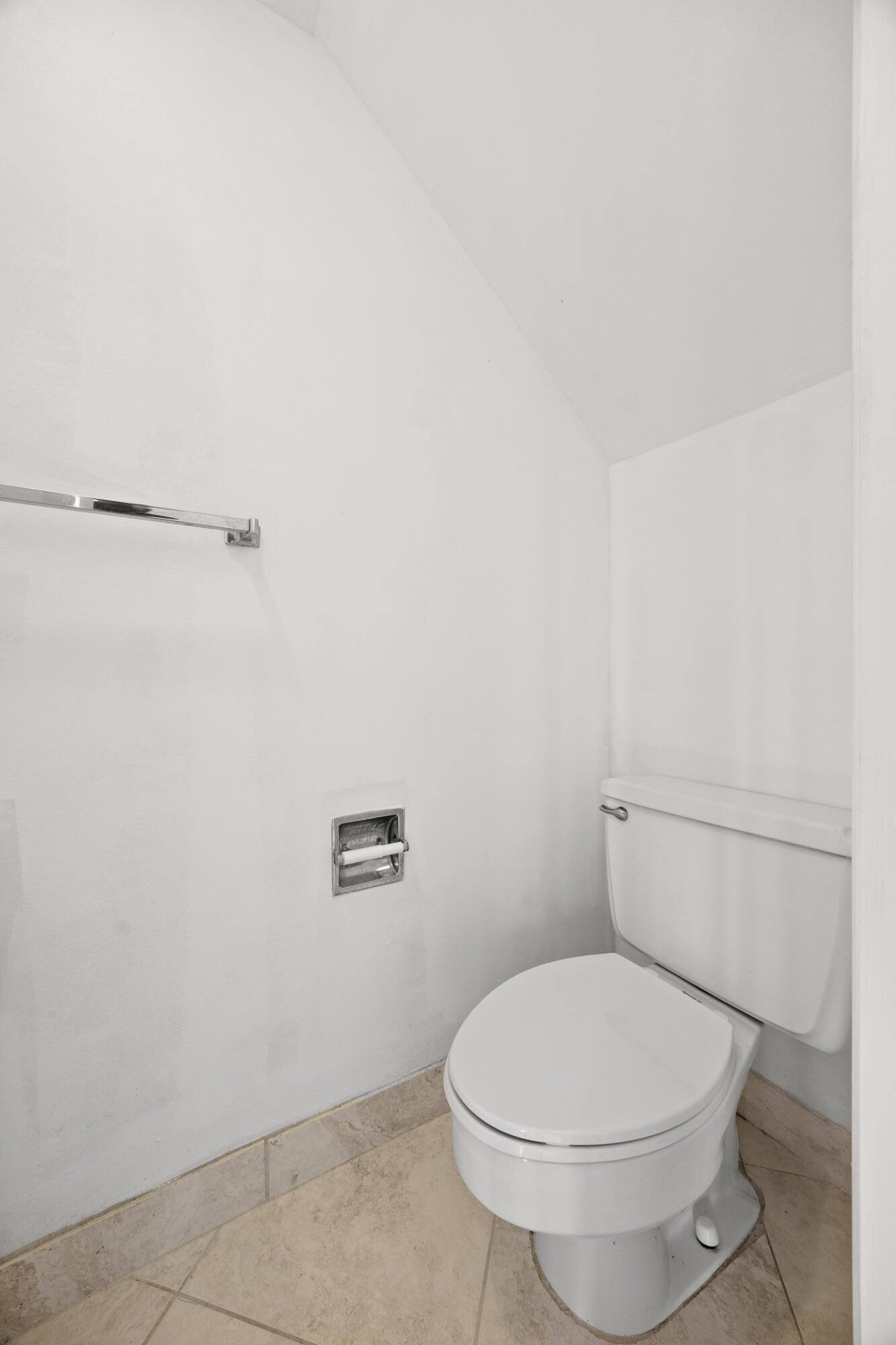 Undisclosed Address Boca Raton, FL 33432 - Photo 18 of 27 a white toilet sitting next to a shower