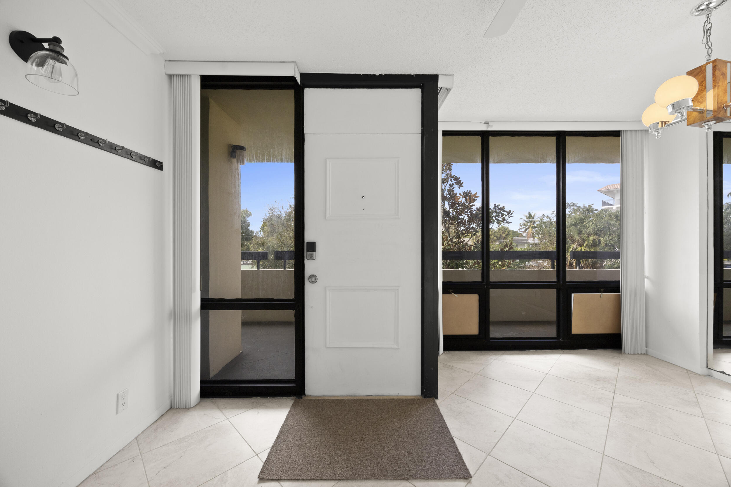Undisclosed Address Boca Raton, FL 33432 - Photo 4 of 27 a view of an empty room with a window