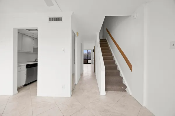 a view of an entryway with stairs