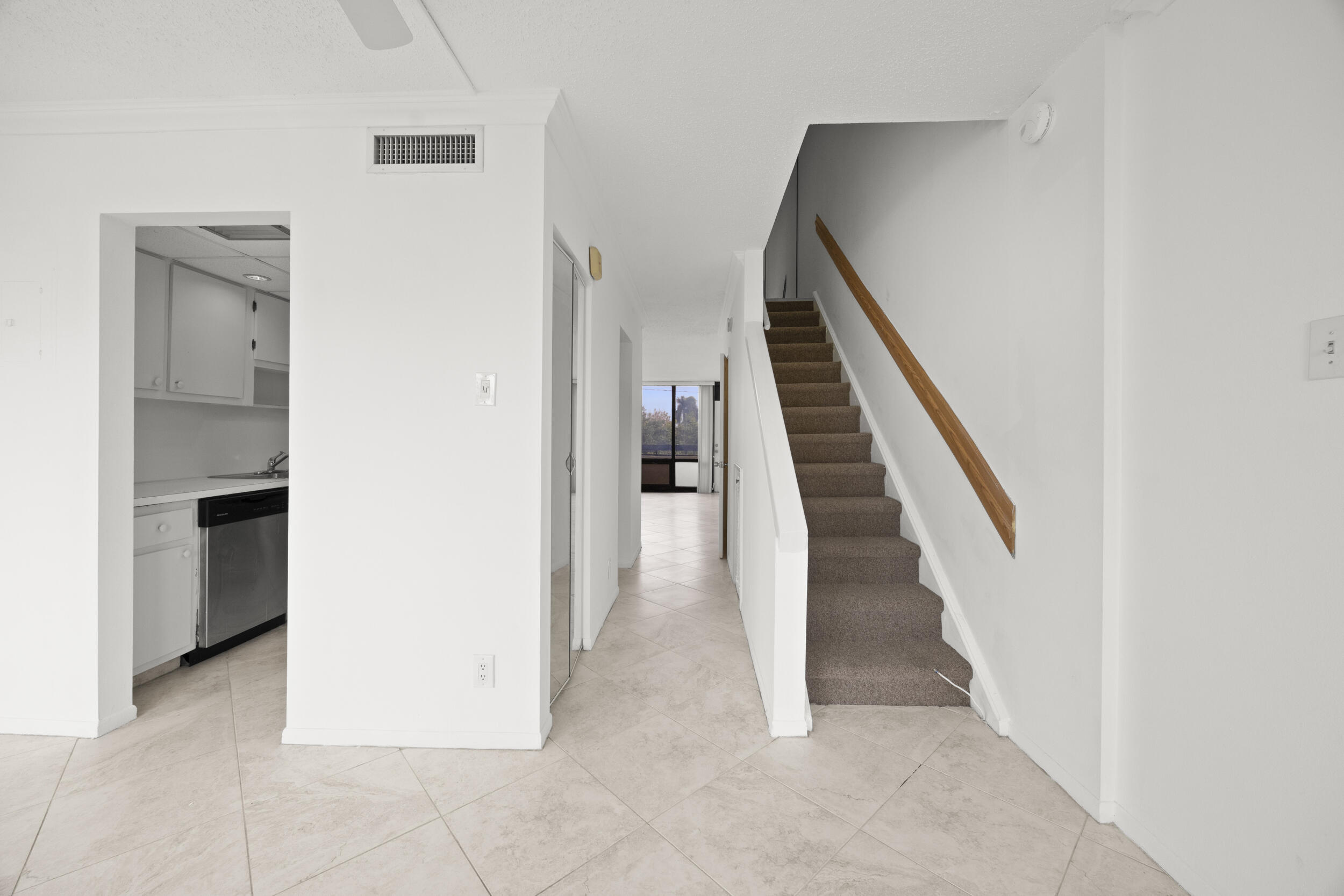 Undisclosed Address Boca Raton, FL 33432 - Photo 6 of 27 a view of an entryway with stairs