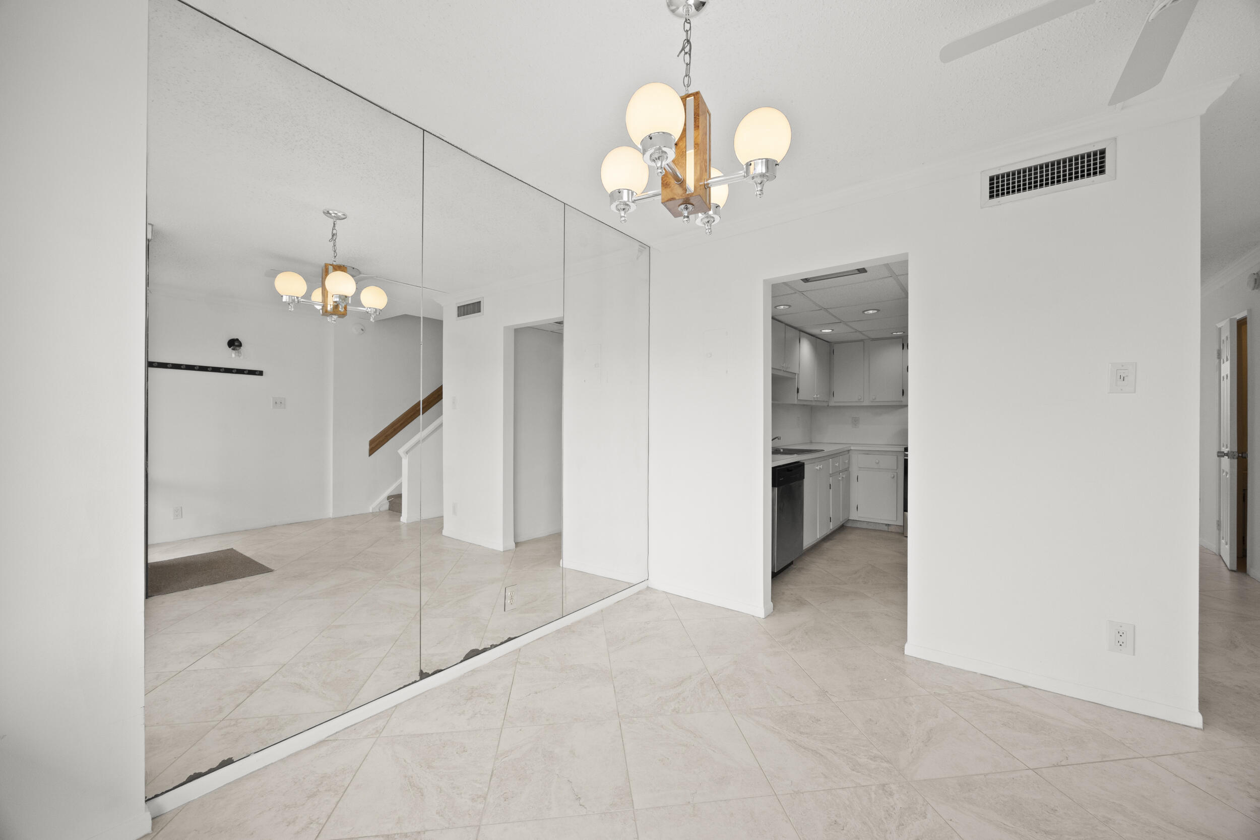 Undisclosed Address Boca Raton, FL 33432 - Photo 7 of 27 a view of a chandelier in a room