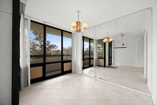a view of an entryway with a chandelier