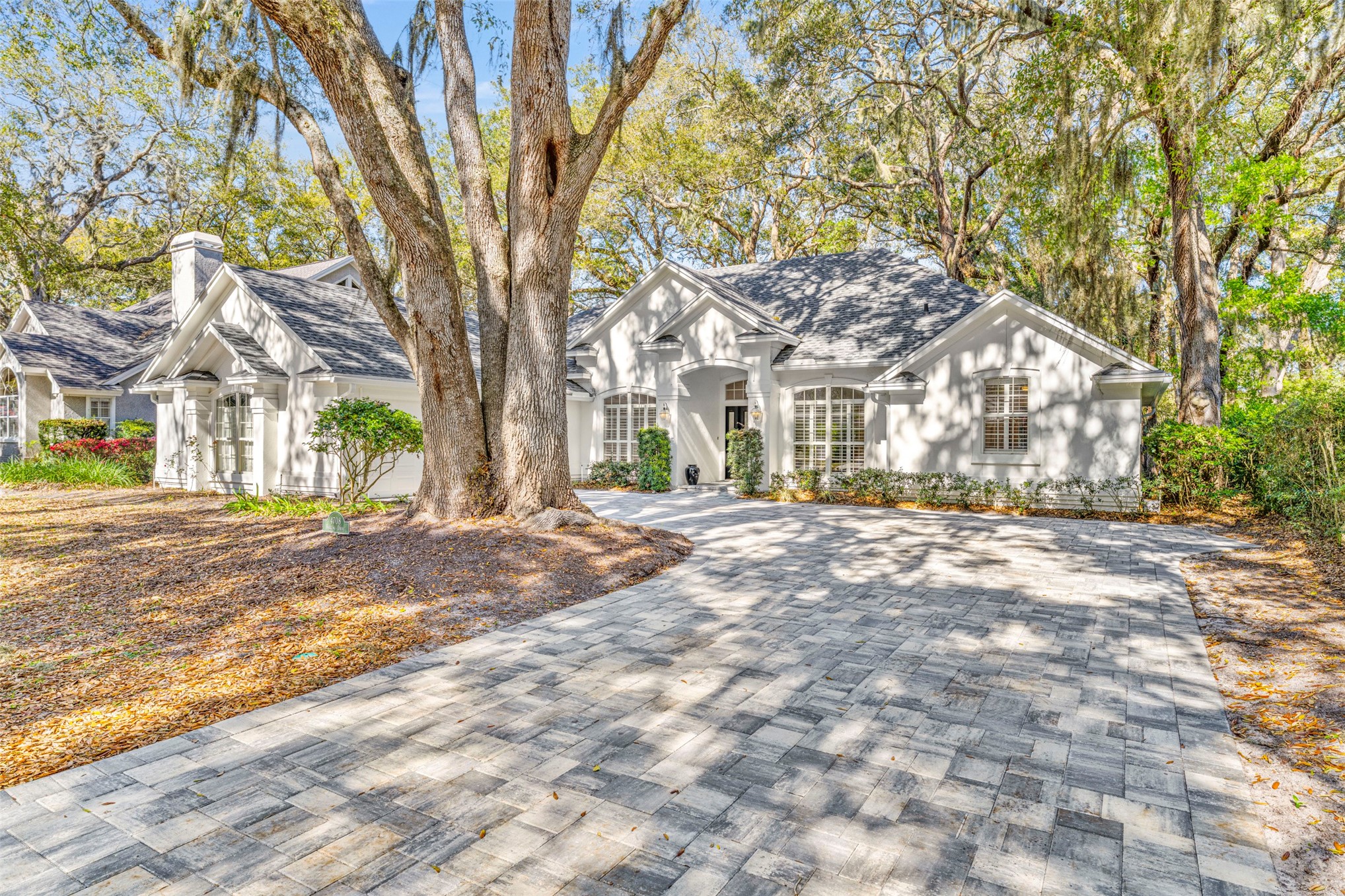 4708 Rigging Drive Fernandina Beach, FL 32034 - Photo 1 of 32 a front view of a house with a tree s