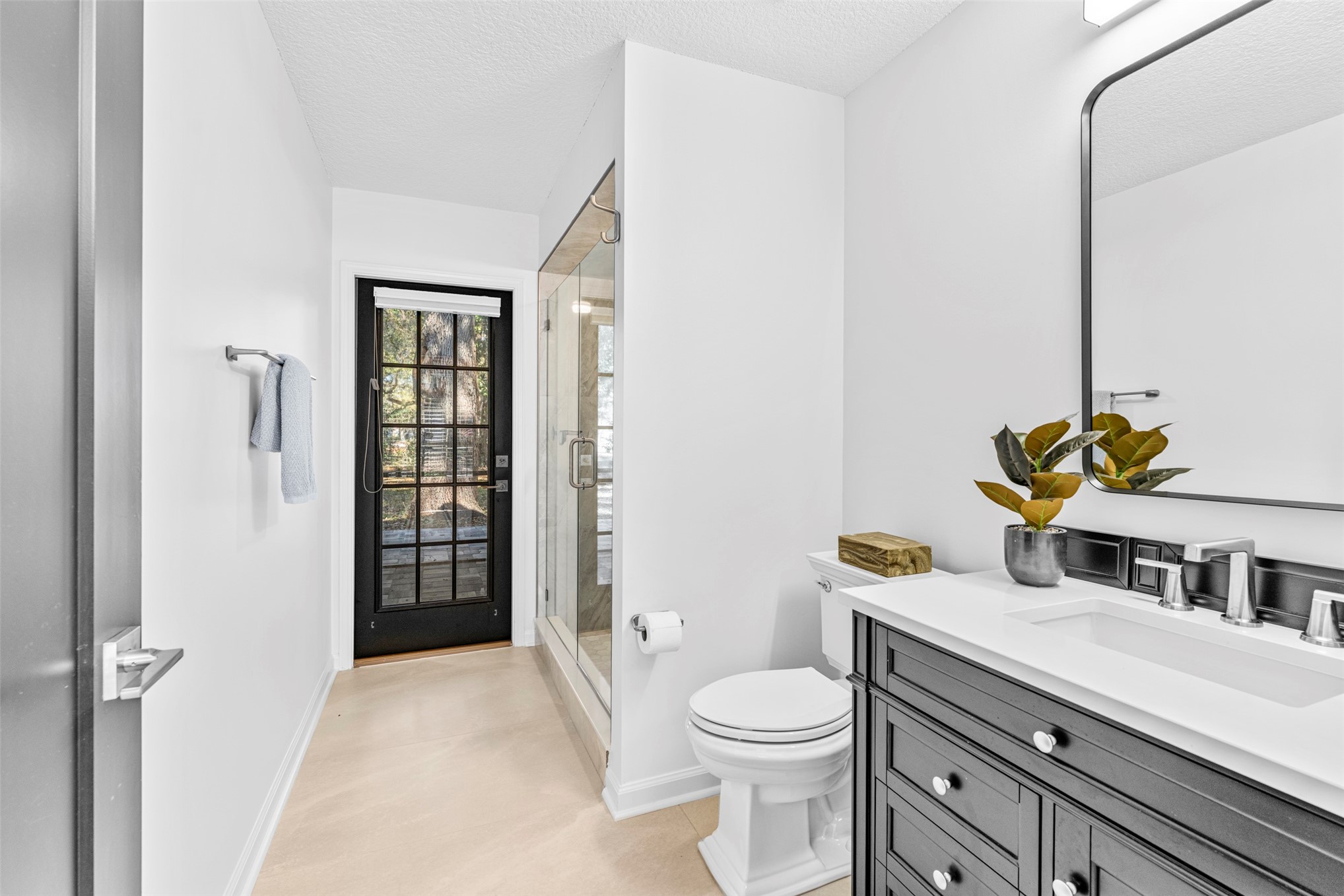 4708 Rigging Drive Fernandina Beach, FL 32034 - Photo 13 of 32 a bathroom with a sink a toilet and shower