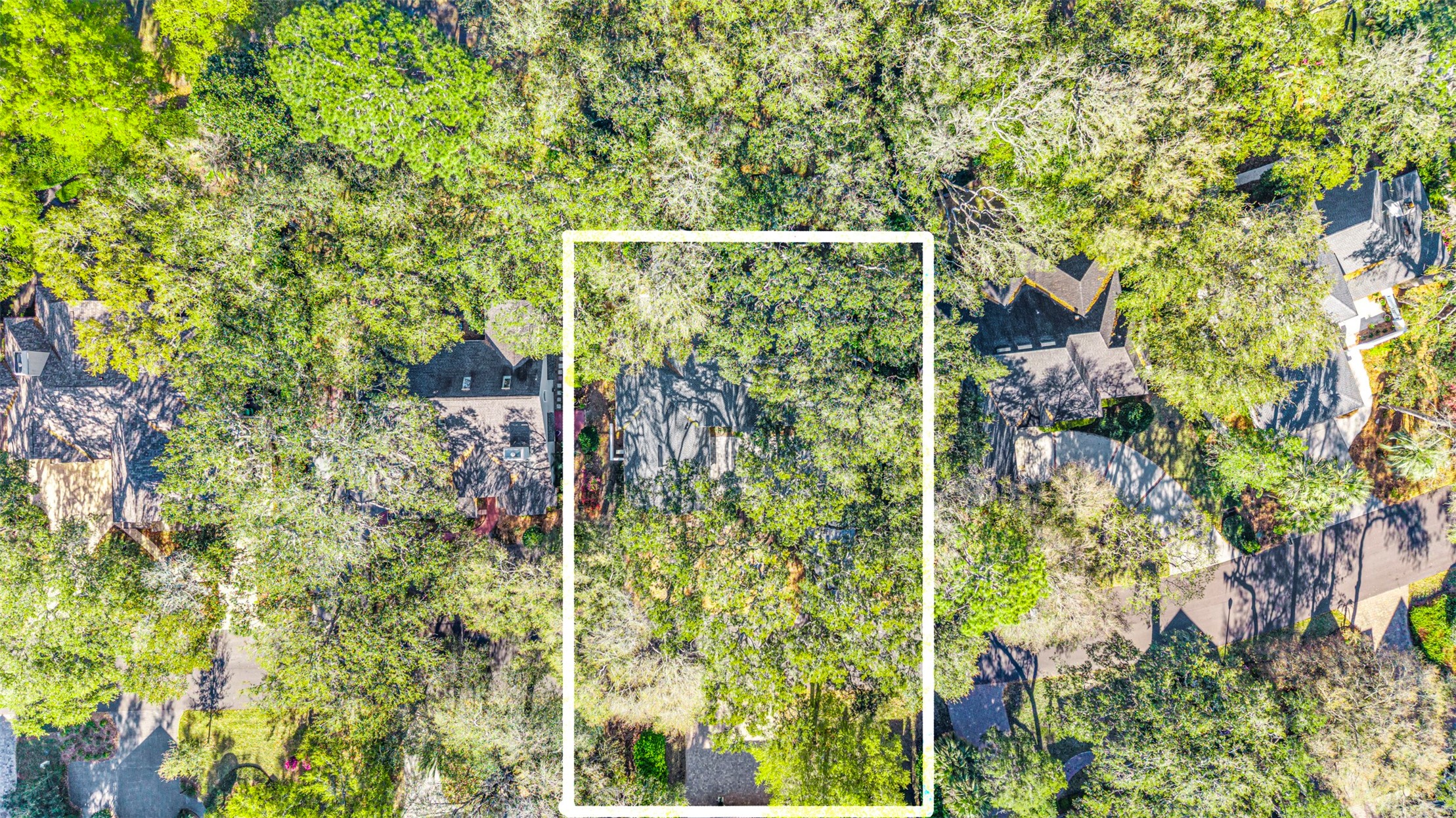 4708 Rigging Drive Fernandina Beach, FL 32034 - Photo 25 of 32 a wooden fence with some trees in the background