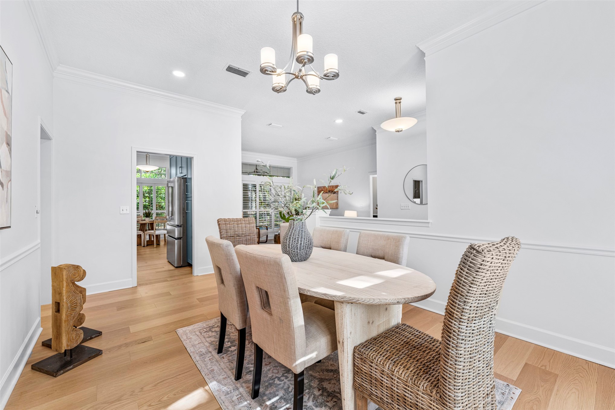 4708 Rigging Drive Fernandina Beach, FL 32034 - Photo 4 of 32 a view of a dining room with furniture and wooden floor