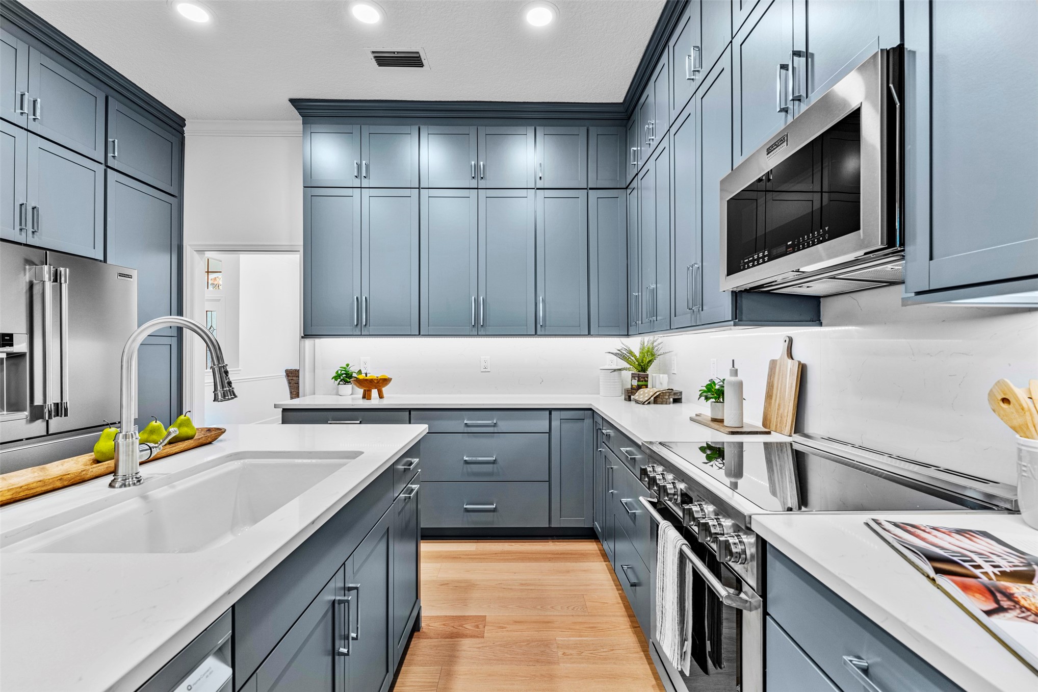 4708 Rigging Drive Fernandina Beach, FL 32034 - Photo 9 of 32 a kitchen with granite countertop a sink stainless steel appliances and counter space