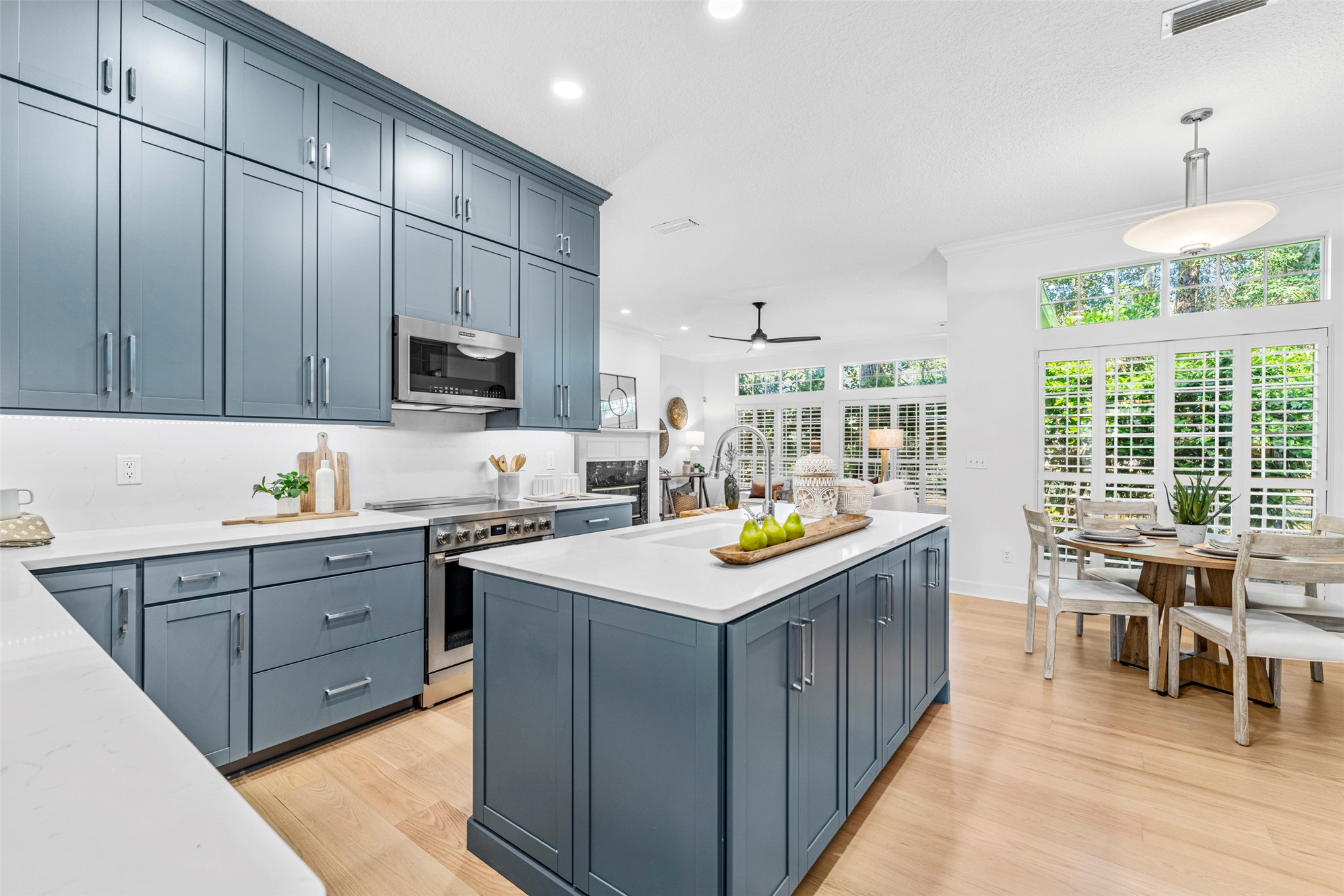 4708 Rigging Drive Fernandina Beach, FL 32034 - Photo 10 of 32 a kitchen with a stove window and cabinets