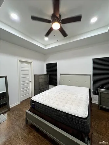 a bathroom with a double vanity sink and mirror