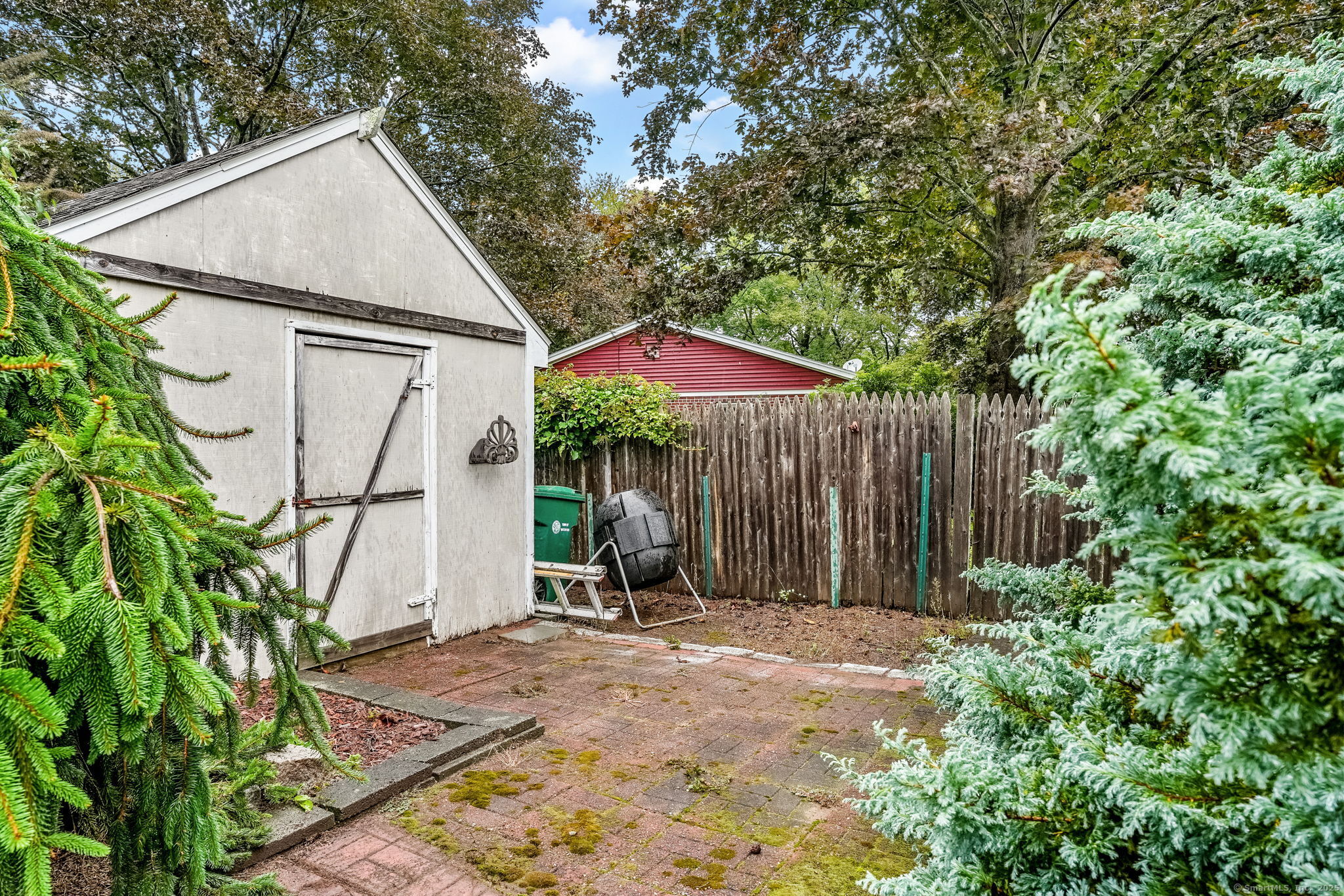 1 Chapman Avenue Waterford, CT 06385 - Photo 13 of 39 a backyard of a house with table and chairs