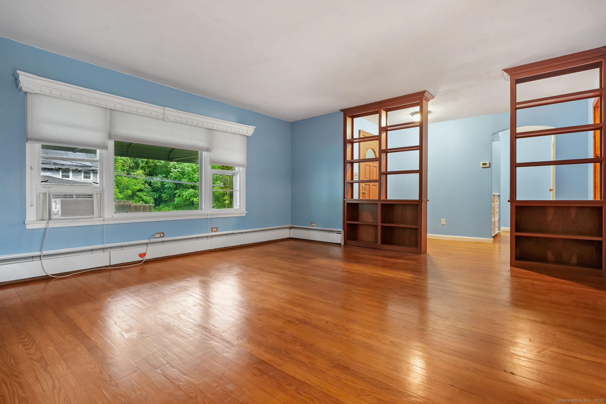 1 Chapman Avenue Waterford, CT 06385 - Photo 14 of 39 wooden floor in an empty room with a window