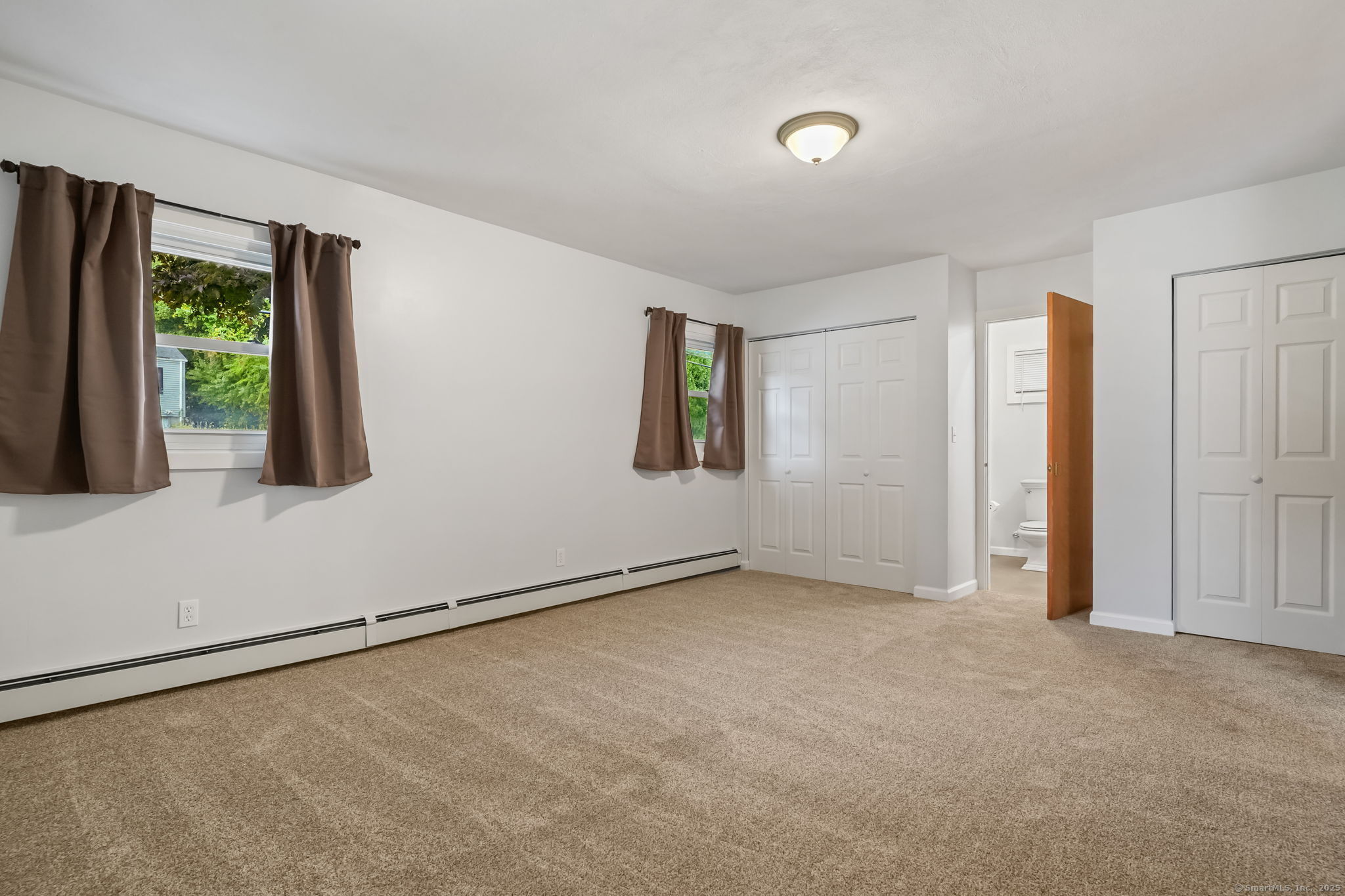 1 Chapman Avenue Waterford, CT 06385 - Photo 17 of 39 a view of an empty room with a window