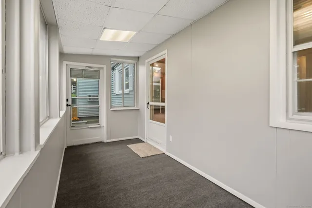 an empty room with windows