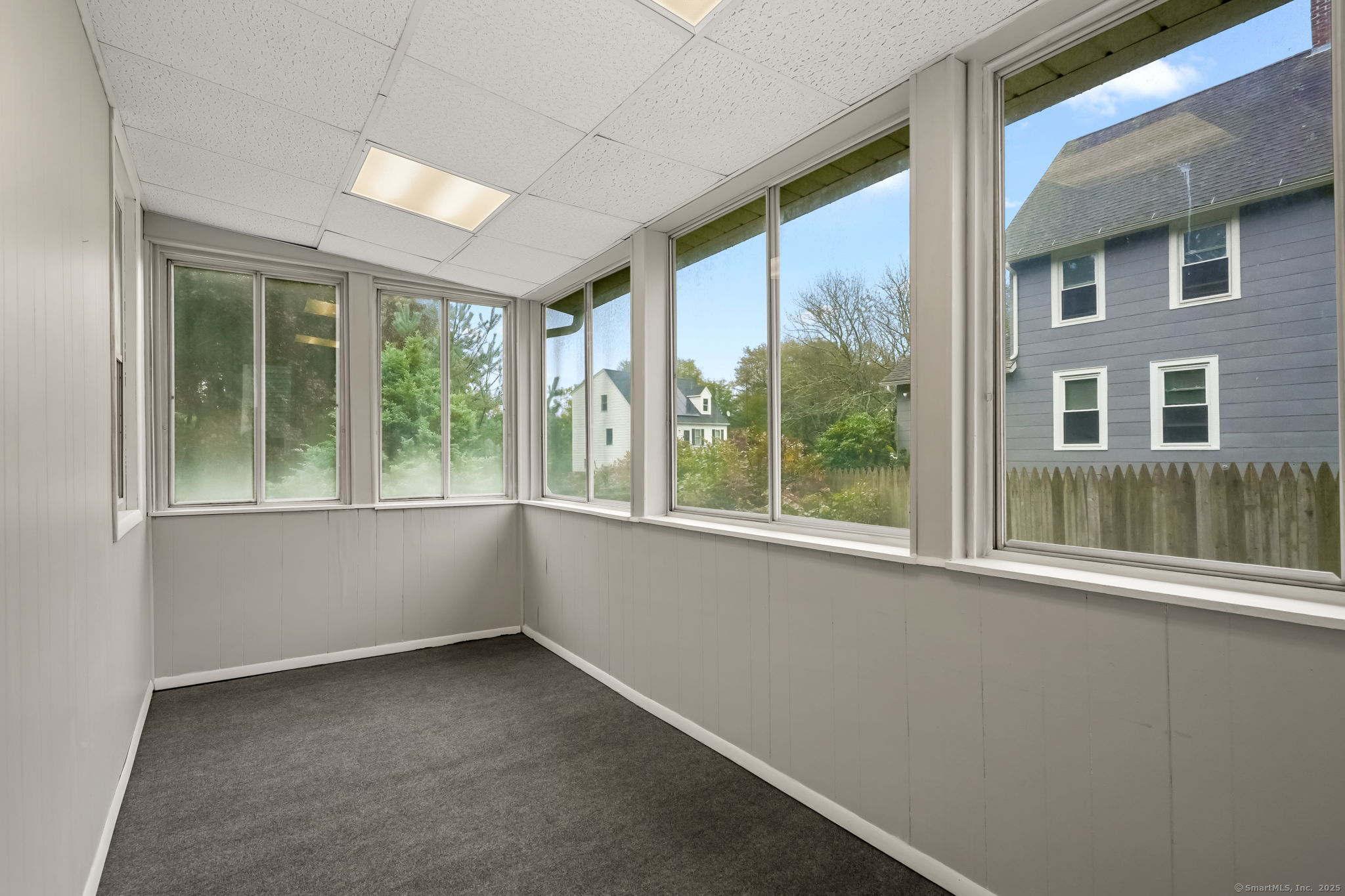 1 Chapman Avenue Waterford, CT 06385 - Photo 27 of 39 an empty room with windows