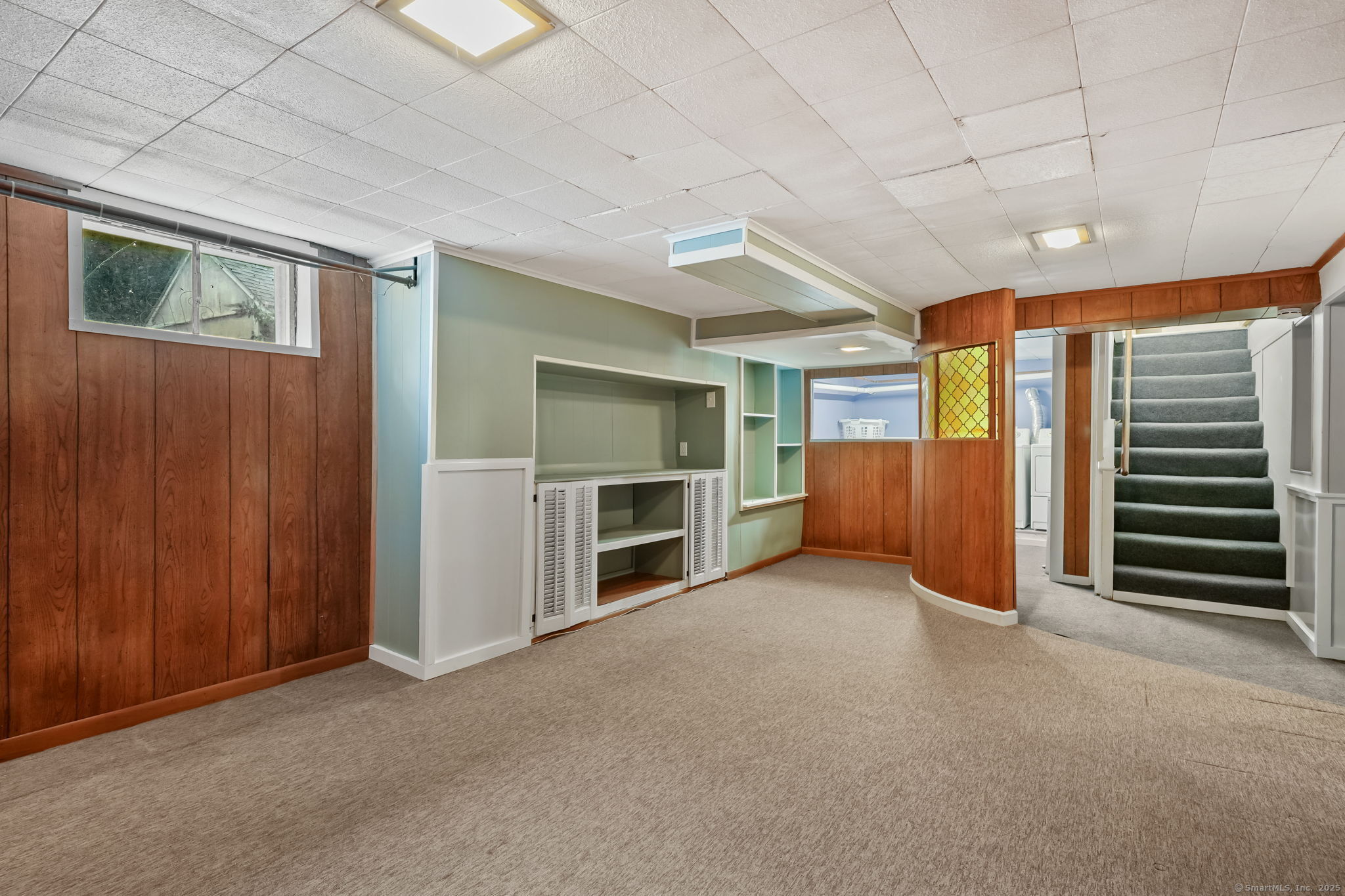 1 Chapman Avenue Waterford, CT 06385 - Photo 32 of 39 a view of an empty room with a fireplace and a window
