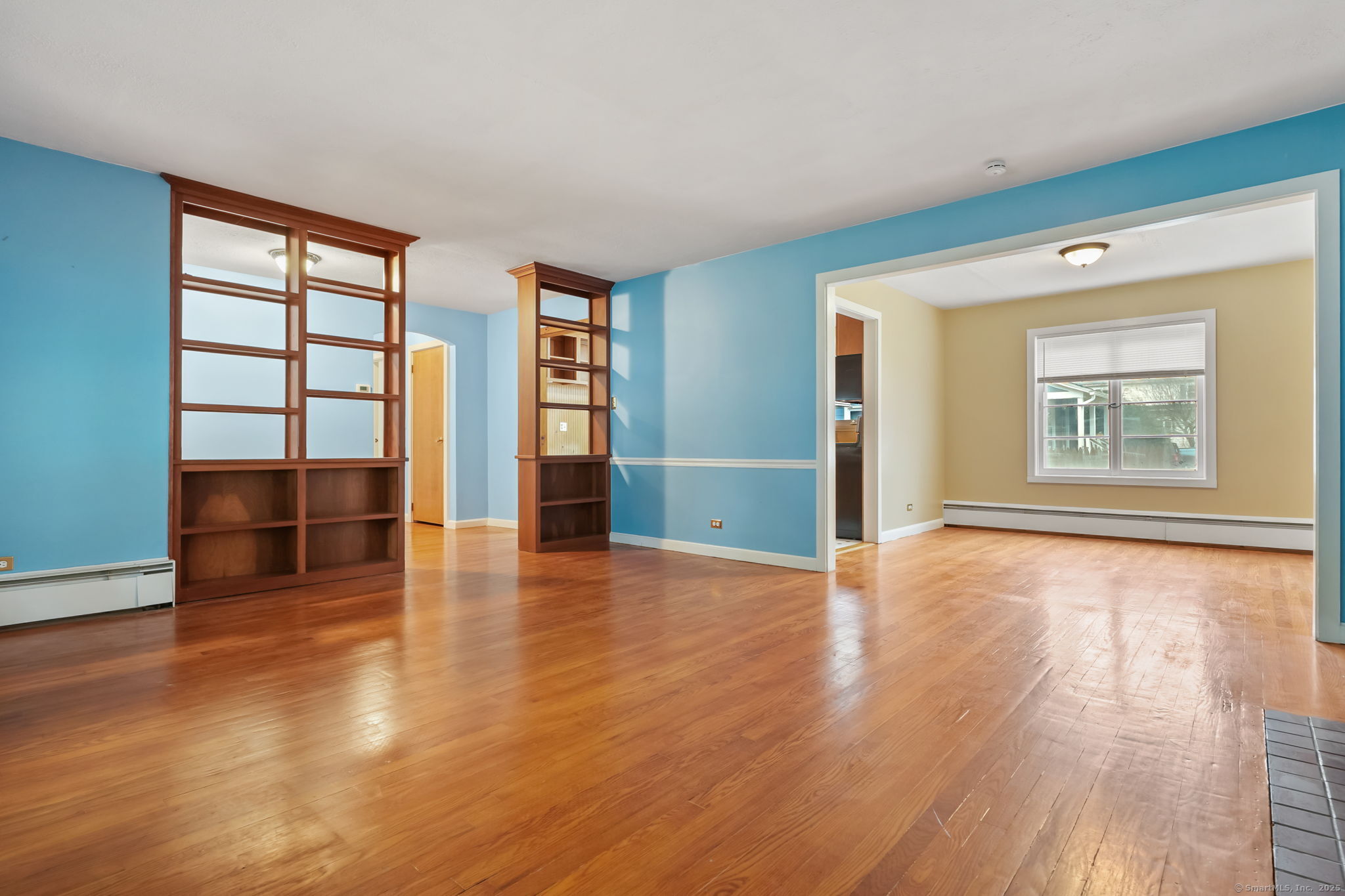 1 Chapman Avenue Waterford, CT 06385 - Photo 5 of 39 an empty room with wooden floor and windows