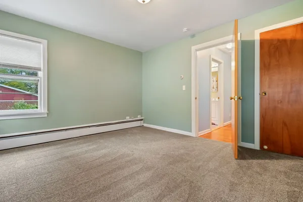 an empty room with window