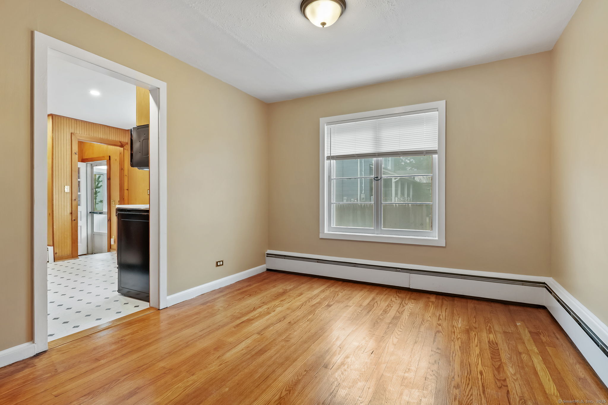 1 Chapman Avenue Waterford, CT 06385 - Photo 8 of 39 wooden floor in an empty room with a window