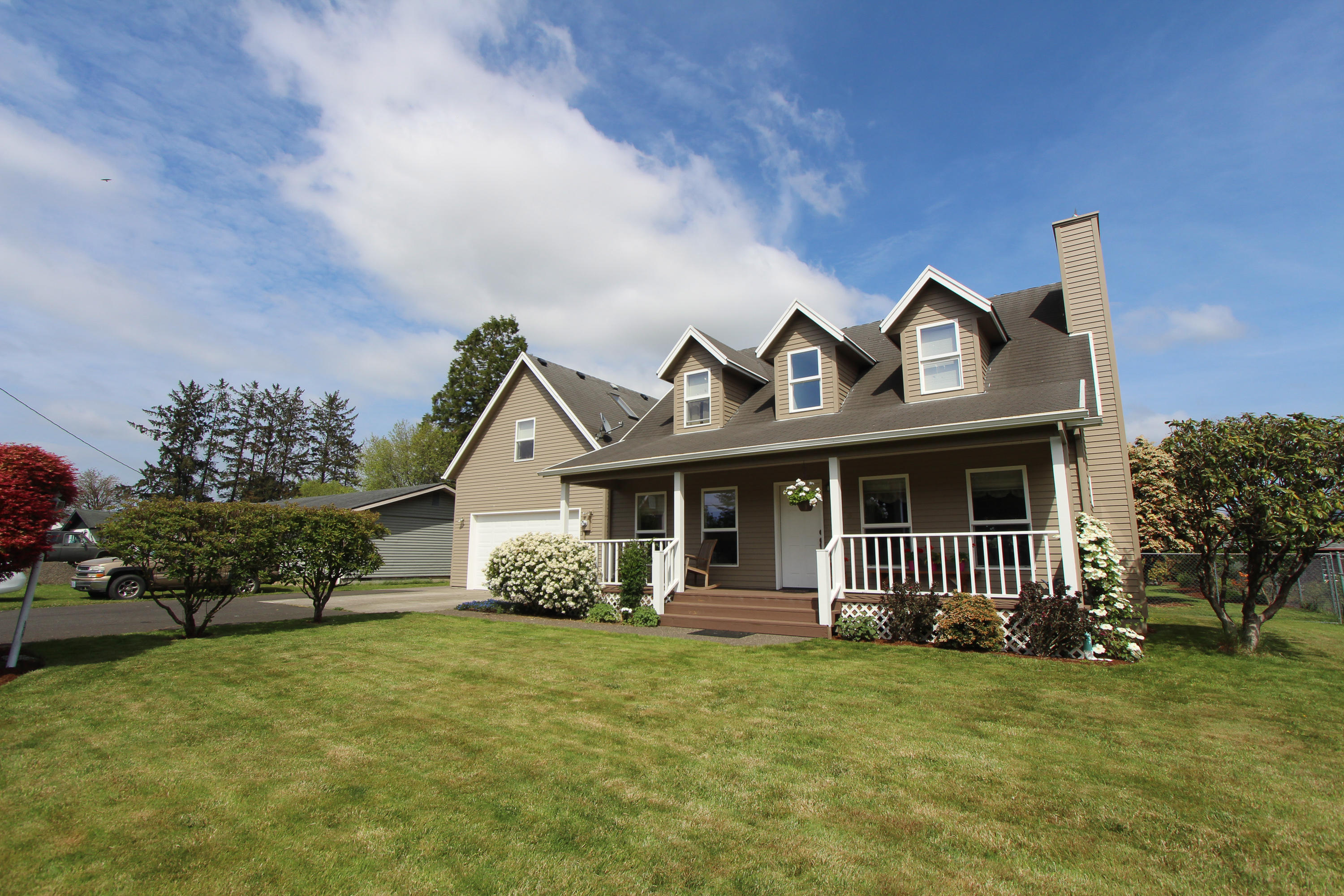 3225 Fitzpatrick Road Tillamook, OR 97141 - Photo 39 of 50 a front view of a house with garden