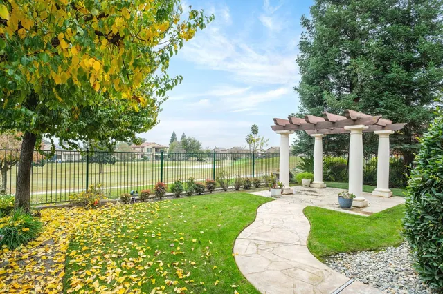a view of a house with a big yard