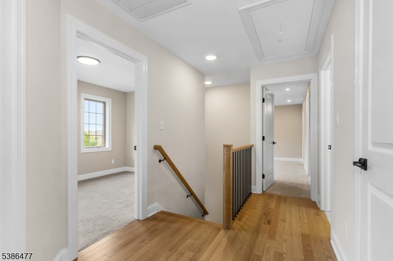5 Percy Place Andover, NJ 07821 - Photo 24 of 50 a view of hallway with window and wooden floor