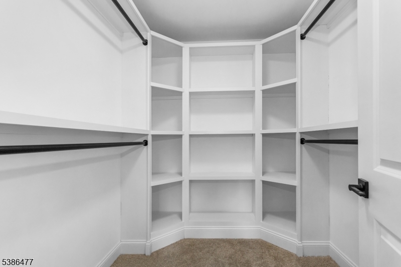 5 Percy Place Andover, NJ 07821 - Photo 28 of 50 a view of walk in closet with empty racks