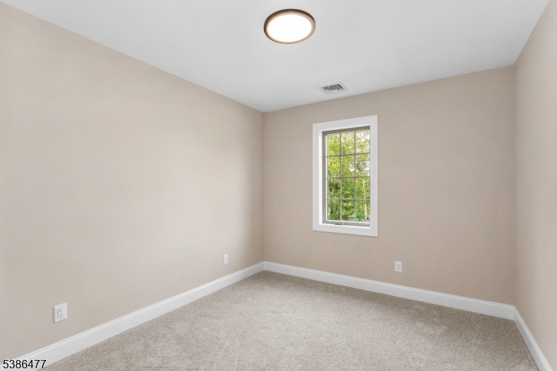 5 Percy Place Andover, NJ 07821 - Photo 32 of 50 an empty room with a window