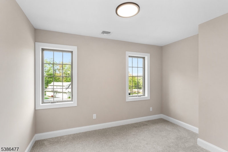 5 Percy Place Andover, NJ 07821 - Photo 34 of 50 an empty room with windows