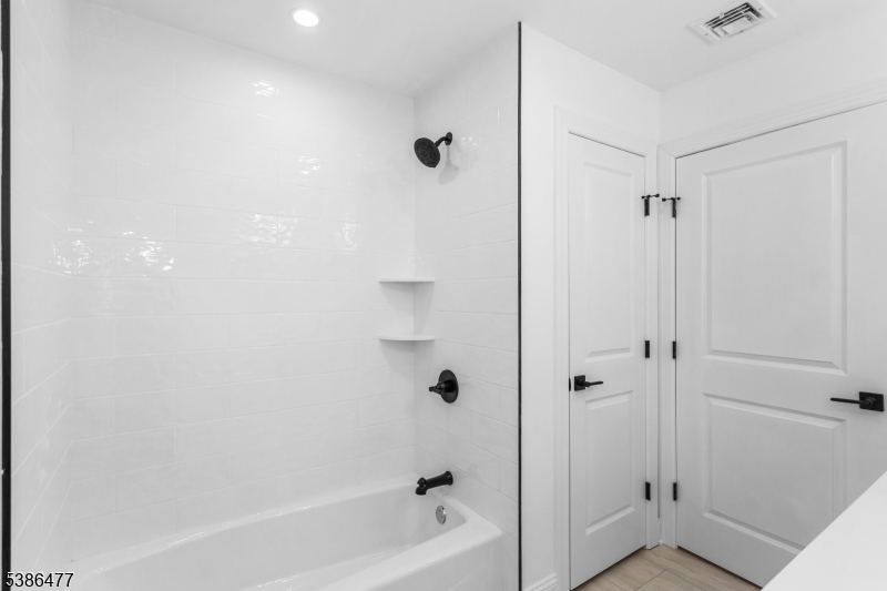 5 Percy Place Andover, NJ 07821 - Photo 37 of 50 a bathroom with a bathtub and a shower
