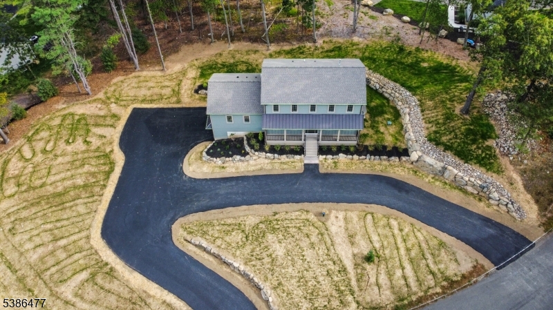 5 Percy Place Andover, NJ 07821 - Photo 49 of 50 an aerial view of a house with swimming pool