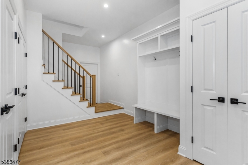 5 Percy Place Andover, NJ 07821 - Photo 8 of 50 a view of entryway with stairs and wooden floor