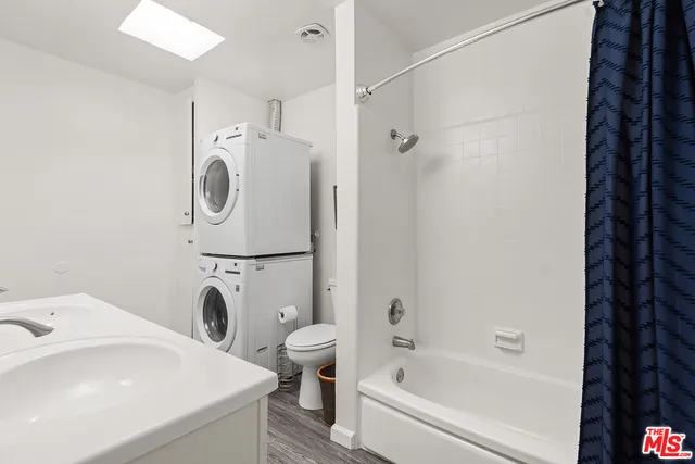 a bathroom with a sink and a bathtub