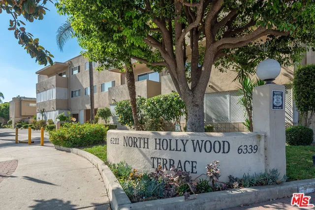 a sign that is on the side of a road