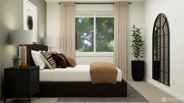 a bedroom with a bed and a night stand