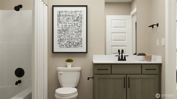 a bathroom with a potted plant and a window