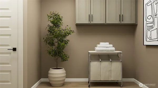 a picture of a room with a white wall and a refrigerator