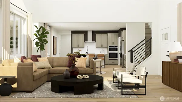a living room with furniture and a potted plant