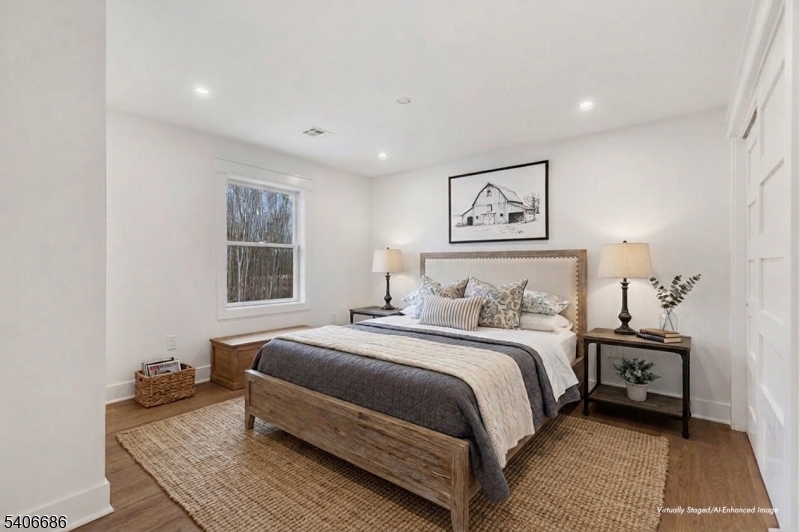 759 Mechlin Corner Road Hampton, NJ 08827 - Photo 31 of 45 a bedroom with a bed and a couch