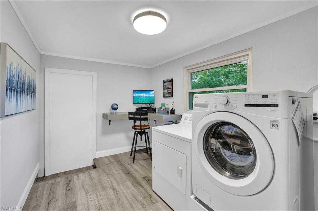 54 Hilo Court, Unit 54 Naples, FL 34112 - Photo 13 of 17 Utility Studio featuring multi-use office/ laundry space.