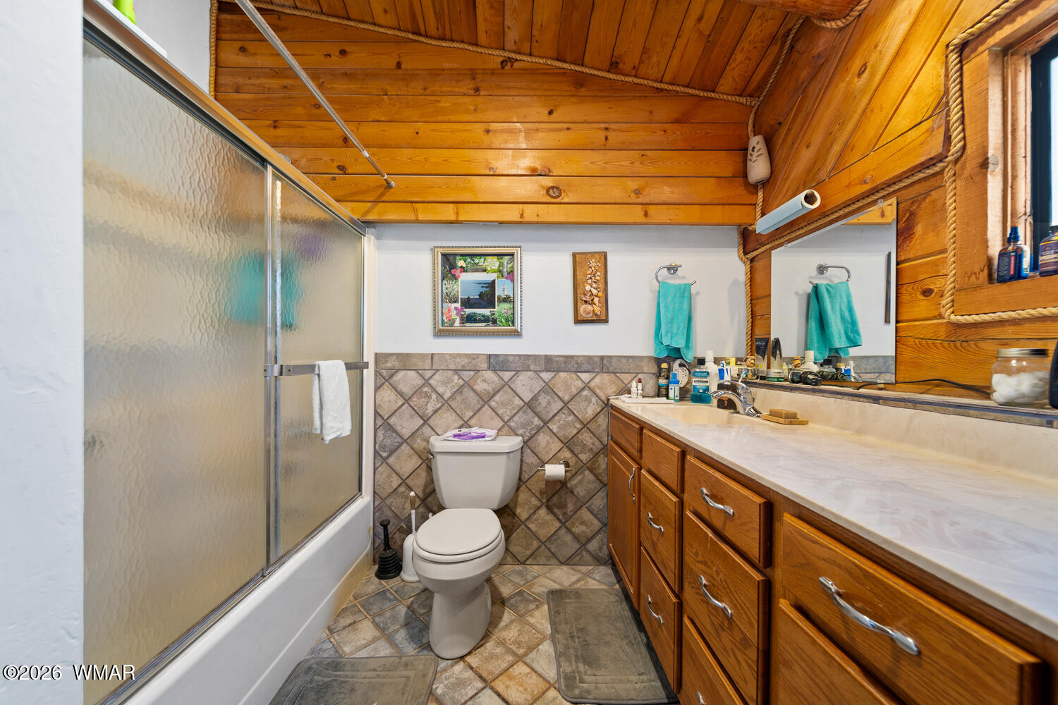 6720 Cheney Ranch Loop Show Low, AZ 85901 - Photo 44 of 55 a bathroom with a sink a toilet and shower
