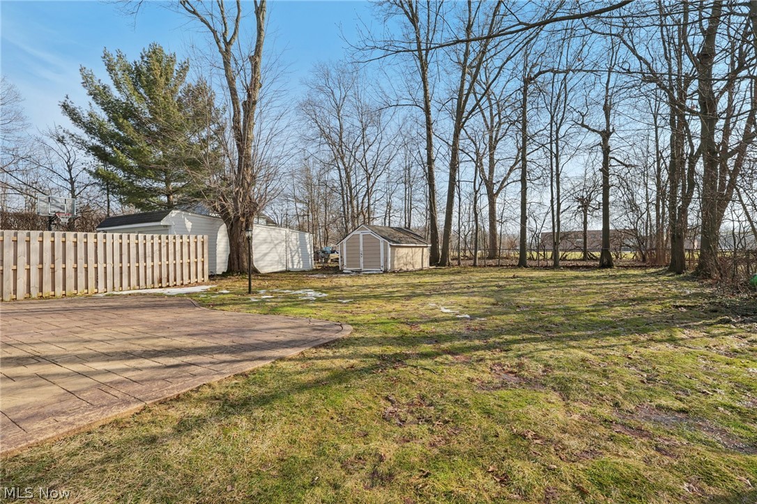 4784 Burger Road Cleveland, OH 44121 - Photo 25 of 27 Large yard and storage shed!! Room for cookouts, kids or whatever you like.